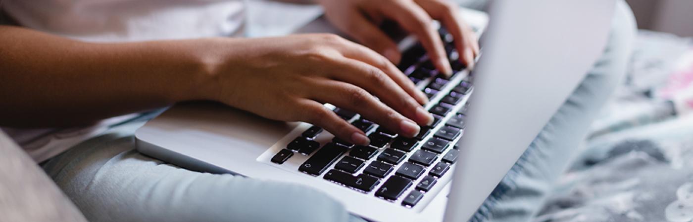 person using laptop