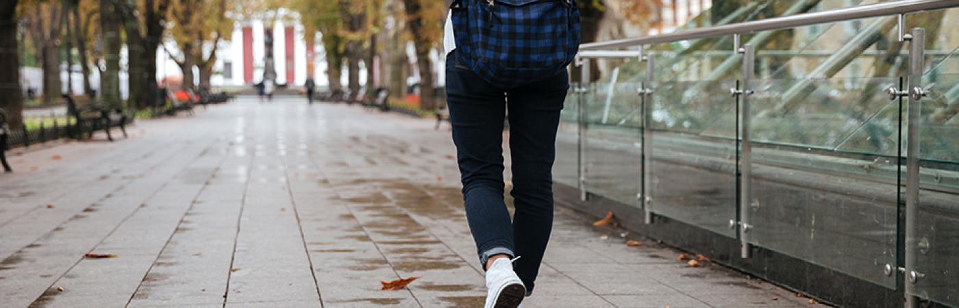 student with backpack