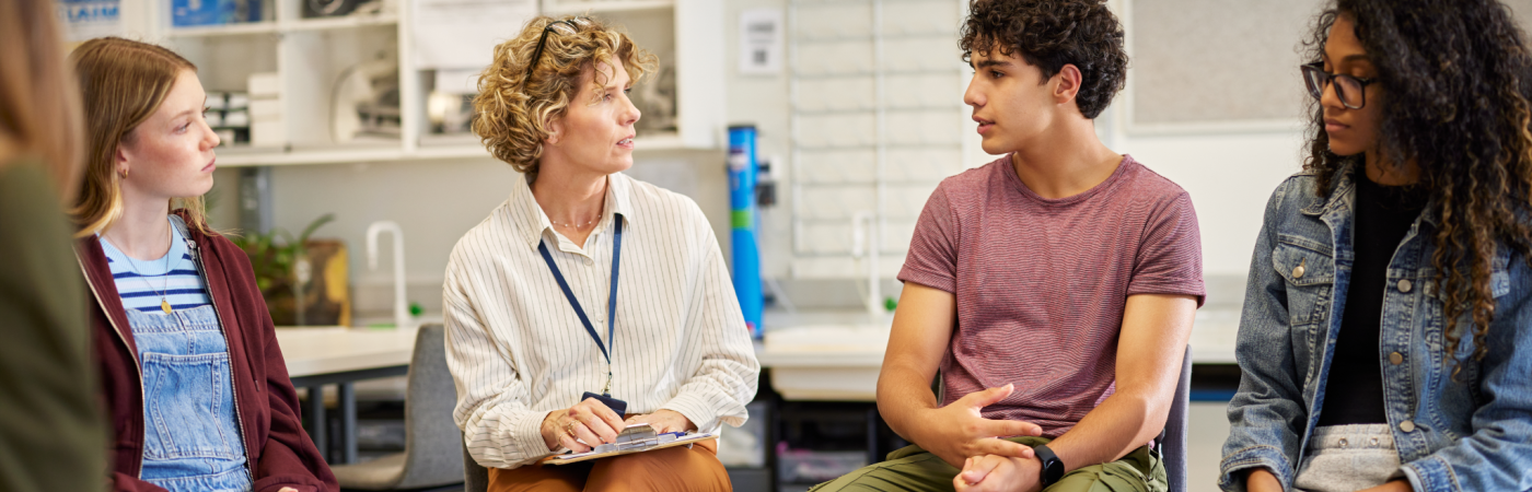 Counselor with students