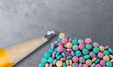 Fentanyl pencil and rainbow pills