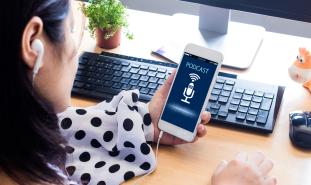 woman listening to podcast