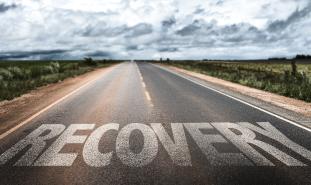 recovery written on a road