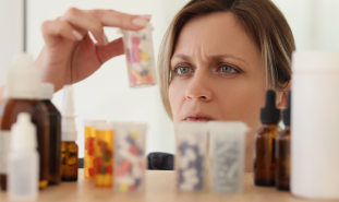 Medicine cabinet with pill bottles