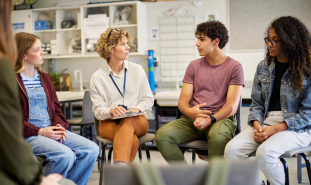 Counselor with students