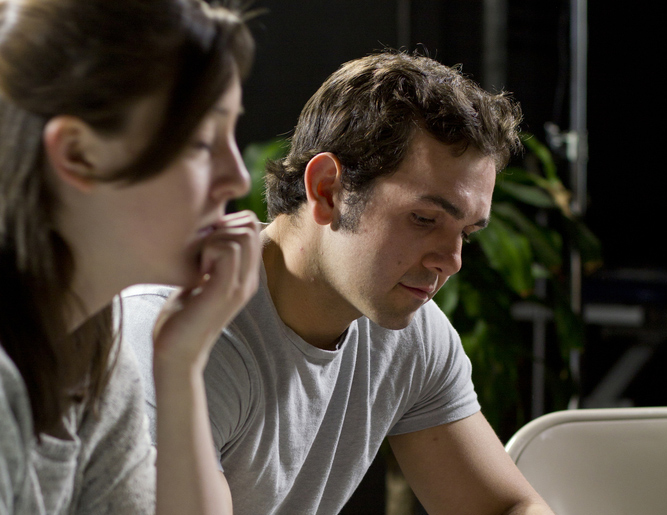 stock art: two actors pose at drug counseling session